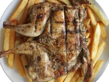 سمان مشوى على الفحم