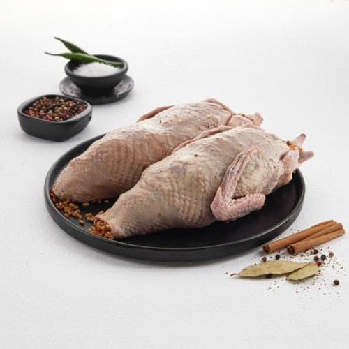 Pair Of Stuffed Pigeons Ready to Boil