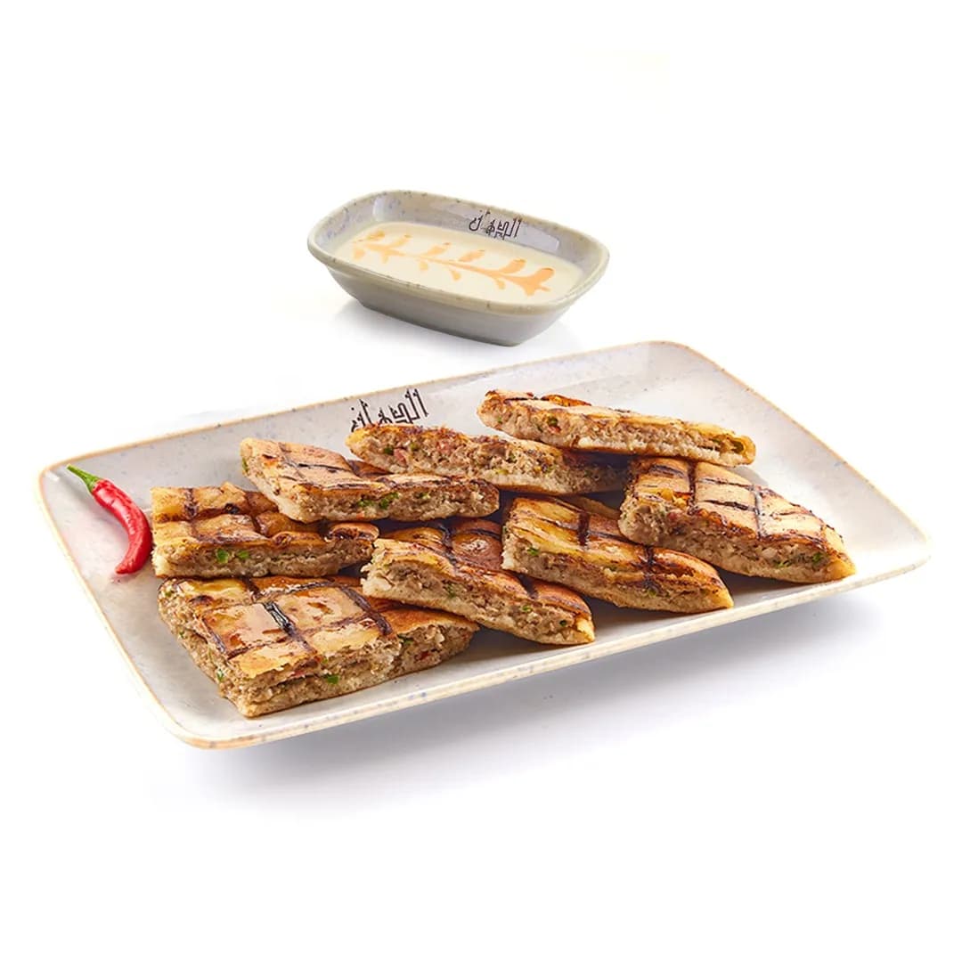 1 Hawawshi + Tahini Salad